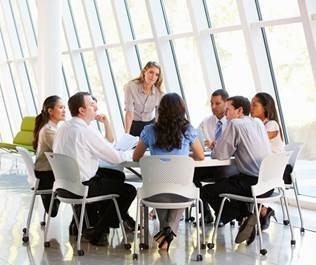 Employee Leasing Photo of people around a table
